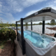 Champion Hot Tubs | Swim Spa vs Swimming Pool: Which Is the Better Investment for Your Home?